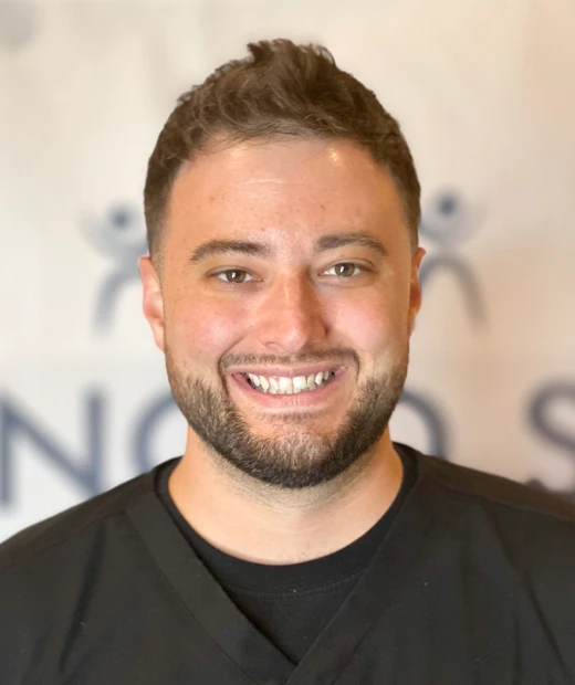 Chiropractor Jordan Rutz in a professional headshot photo