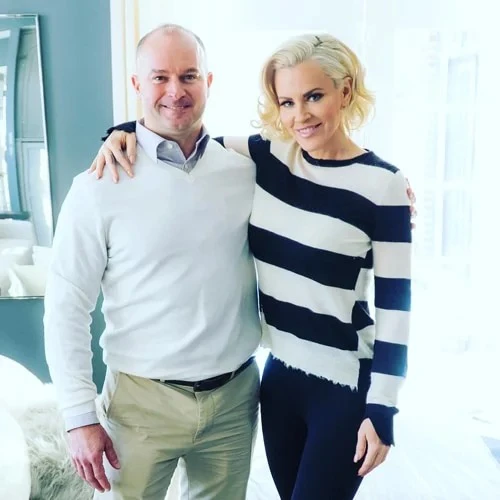 Jenny McCarthy posing for a photo with Dr. Troy Naftzger