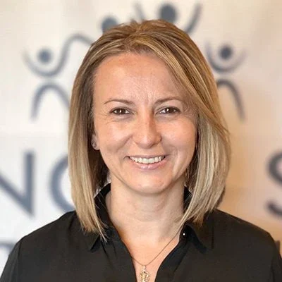 A headshot photo of Amy Usanovic