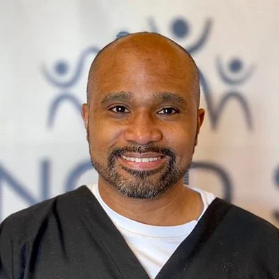 A headshot photo of Edwin Pierre Vines