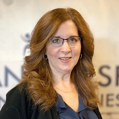 A headshot photo of Laura Trommer